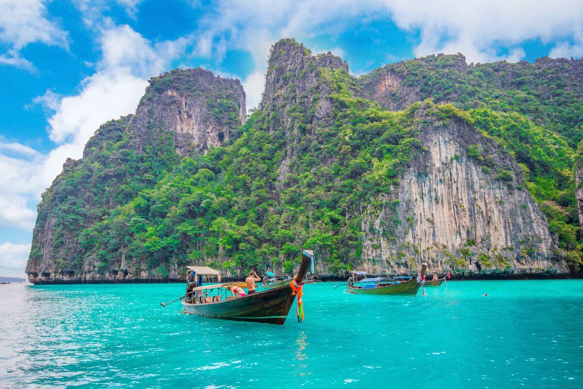 Long boat blue water maya bay phi phi island krabi thailand 1